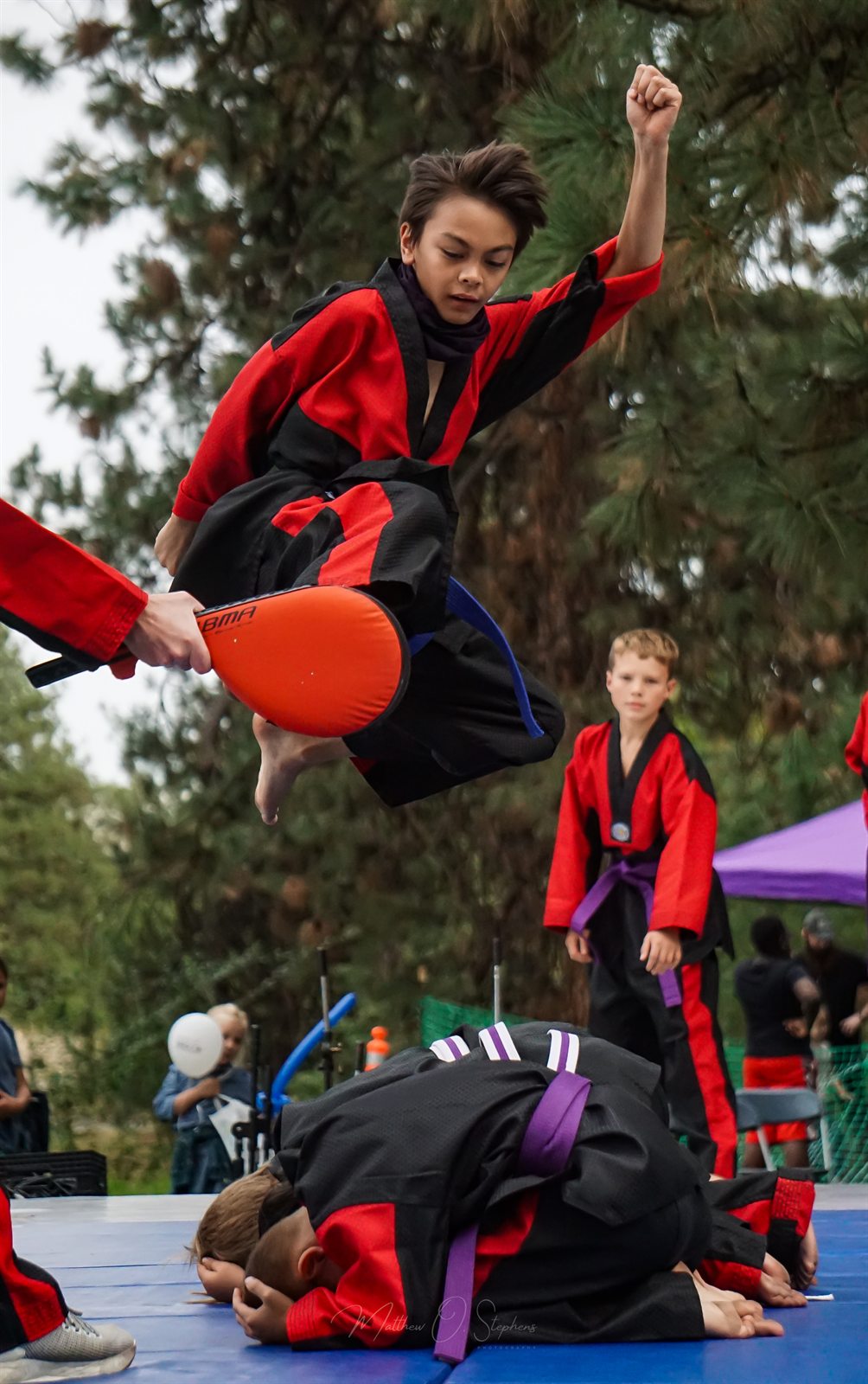 Young martial arts student demonstrating a technique at ValleyFest