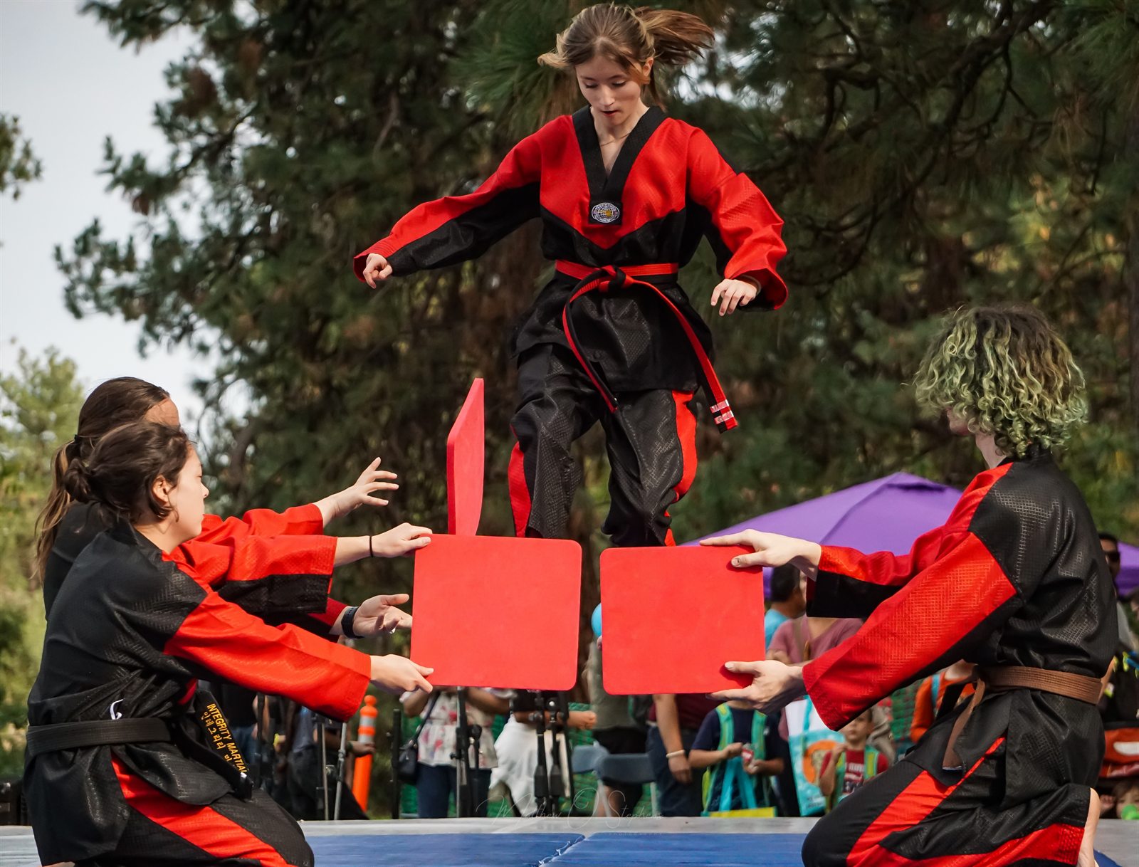 Teen martial artist demonstrating a kick at ValleyFest